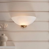 Lampa ścienna półokrągła Welles 112439 szklana biała mosiądz