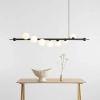 Nowoczesna lampa wisząca Wave 1115T1 Aldex do salonu czarna biała balls