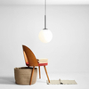 Modernistyczna lampa wisząca BOSSO 1087G1 Aldex szklana kula