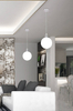 Lampa wisząca kula Oden 31-03287 Candellux regulowana chrom biała