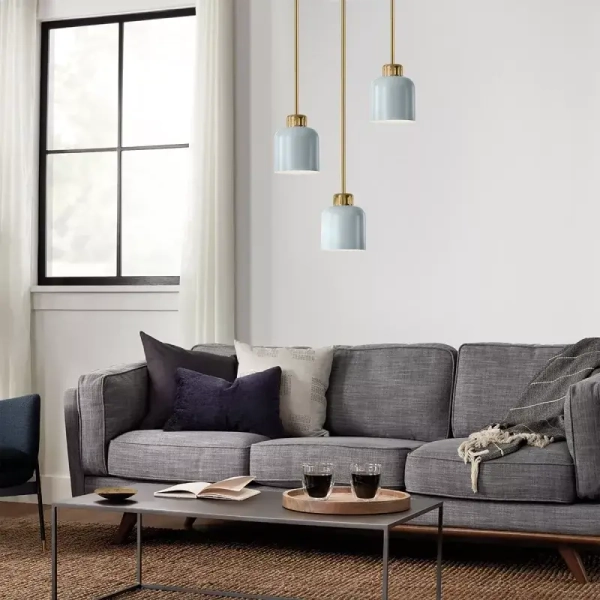 Cylindryczna lampa wisząca York mosiądz jasnoniebieska 1xE27 do salonu ELS-YORK-MP-PNBR-PB