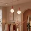 Różowa wisząca lampa RAINBOW P0691 czarna szklana kulista 1xE27