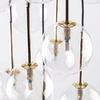Kaskadowa lampa wisząca Nilos 5945 bubble przezroczysta złota