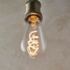 Żarnikowa żarówka gruszka Twist E27 107771 LED 4W 2200K przezroczysta