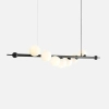 Nowoczesna lampa wisząca Wave 1115T1 Aldex do salonu czarna biała balls