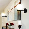 Modernistyczna lampa ścienna KAMA 21-01221 do salonu czarna