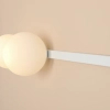 Kulista lampa ścienna GARDA 1099D podwójna do sypialni biała