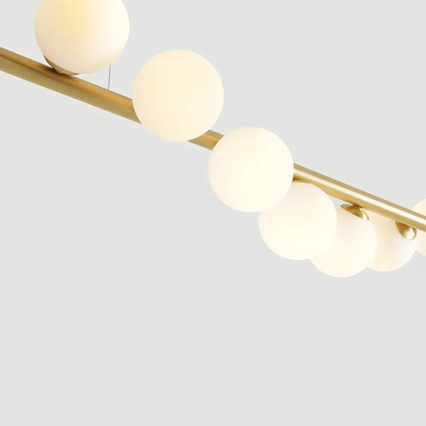 Wisząca lampa pokojowa Wave 1115T40 Aldex szklane kule mosiądz białe