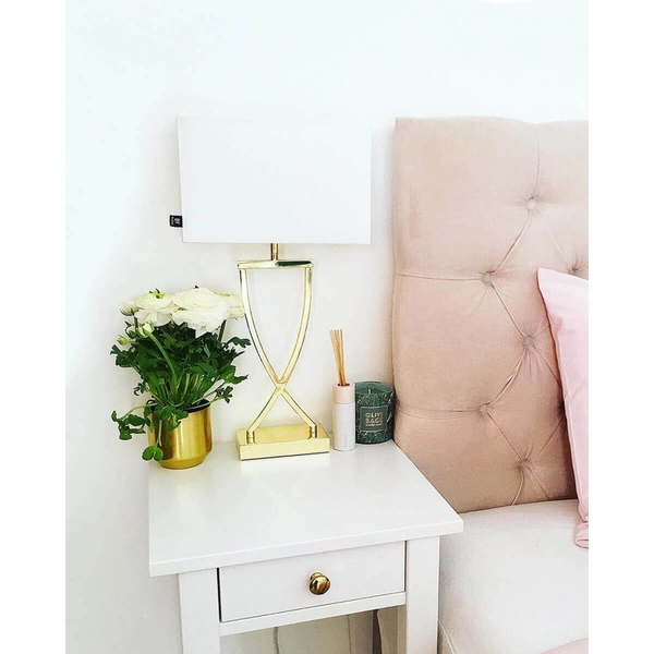 Stojąca lampa sypialniana Omega na szafkę nocną biała złota