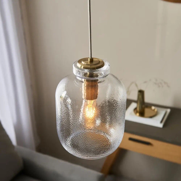 Szklana lampa wisząca Lyra 106923 do jadalni mosiądz przezroczysta