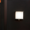 Elewacyjna lampa z czujnikiem DOBLO 6943701125 IP44 LED 12W 4000K szara