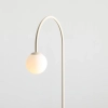 Skandynawska lampa podłogowa UNA 1116A9 łukowa kremowa