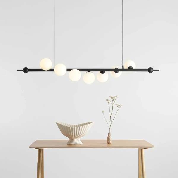 Nowoczesna lampa wisząca Wave 1115T1 Aldex do salonu czarna biała balls