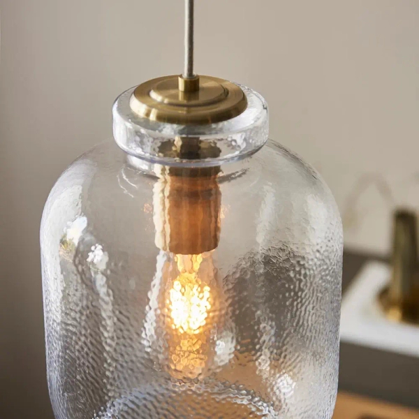 Szklana lampa wisząca Lyra 106923 do jadalni mosiądz przezroczysta