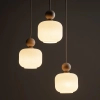 Ekologiczna lampa wisząca Ballo 11050 mleczne kule drewniana brązowy