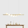 Wisząca lampa pokojowa Wave 1115T40 Aldex szklane kule mosiądz białe