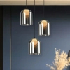 Szklana wisząca lampa Klea 31-38340 szklana na korytarz grafitowa