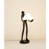 Designerska lampa stojąca HUMAN MSE1501100514 człowiek kule białe czarne