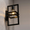 Czarna lampa ścienna Merci do salonu frames metalowa