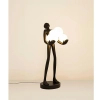 Designerska lampa stojąca HUMAN MSE1501100514 człowiek kule białe czarne