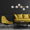 Modernistyczna lampa wisząca ALISA LP-005/6P WH Light Prestige metalowa oprawa szklane kule zwis złoty biały