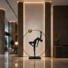 Stojąca lampa WOMAN ARTISTIC czarny złoty F9320 1xE27 40W 200cm kula ring