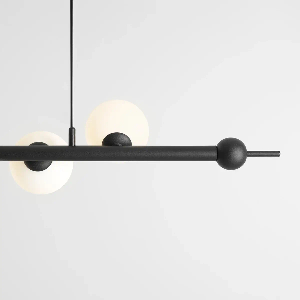 Nowoczesna lampa wisząca Wave 1115T1 Aldex do salonu czarna biała balls
