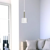 Minimalistyczna lampa wisząca ARENA metalowa okrągła biała złota