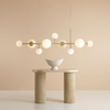 Podwieszana salonowa lampa Dione 1092N40 Aldex balls nad stół złota
