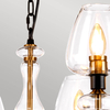 Industrialna lampa wisząca Armand DL-ARMAND8-AB Elstead metalowa złota czarna