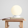 Nocna lampa sypialniana Ball 1076B_M na komodę kulista biała