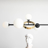 Wisząca lampa DIONE 1092K1 Aldex modernistyczna kule szklane sticks czarne
