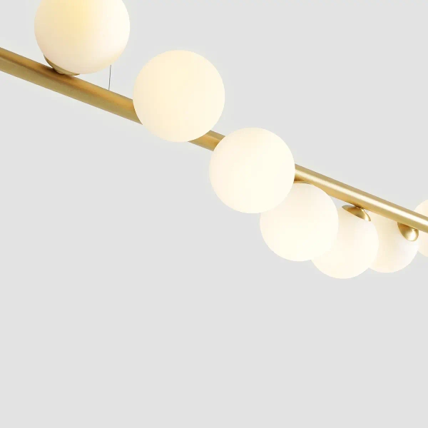 Wisząca lampa pokojowa Wave 1115T40 Aldex szklane kule mosiądz białe