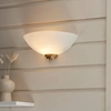 Lampa ścienna półokrągła Welles 112439 szklana biała mosiądz