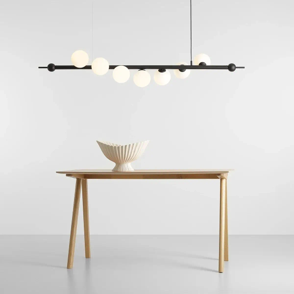 Nowoczesna lampa wisząca Wave 1115T1 Aldex do salonu czarna biała balls