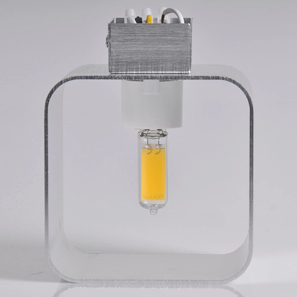 Srebrny kinkiet do sypialni Izar metalowa lampa cube