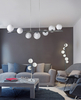 Wisząca lampa salonowa Sybilla szklane kule białe chrom