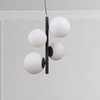 Modernistyczna LAMPA wisząca RIGA PND-44213-4A-SBL Italux metalowa OPRAWA szklane kule zwis czarny