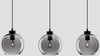 Czarna lampa wisząca Repos szklane kule na listwie loft