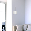 Minimalistyczna lampa wisząca ARENA metalowa okrągła biała złota