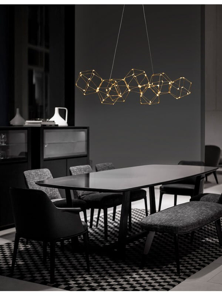 Designerska lampa wisząca Asis druciana do salonu złota