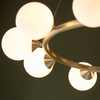 Molekułowa lampa wisząca L&-1106008 nad stół mosiądz biały
