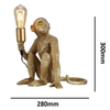 Stołowa lampa małpka Monkey ABR-KARD4-G dekoracyjna do sypialni złoty