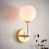 Kulista lampa przyścienna Otto 75960 mosiądz przezroczysty