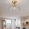 Minimalistyczna sufitowa lampa Jude ALM-JUDE-SF-GD-CL szklana złota