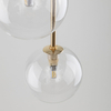 Zwisająca lampa do salonu Nilos 5942 bańka przezroczysta złota